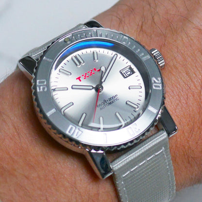 Silver stainless steel dive watch with TXXL logo