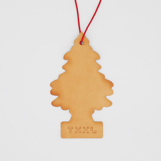 A leather little tree car freshener with a TXXL logo